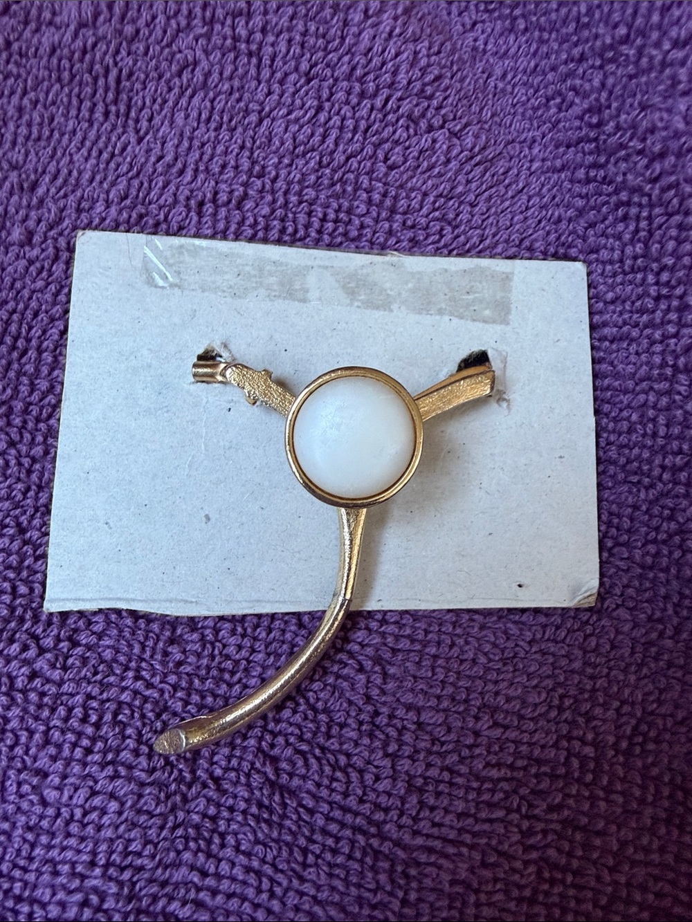 Levi's Gold-Tone Brooch with White Center